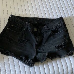 Black distressed shorts